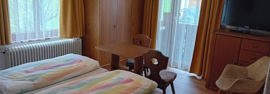 Doppelzimmer beim Dreibettzimmer - Haus Bergkristall - Gries