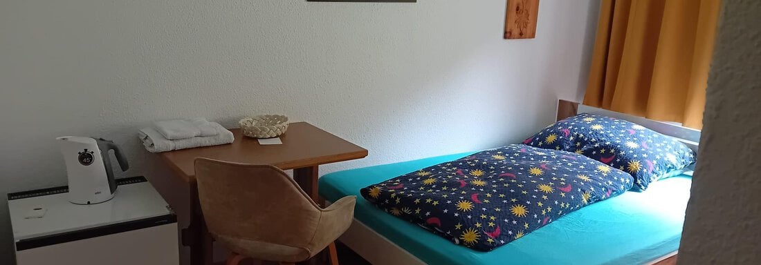 Einzelzimmer beim Dreibettzimmer - Haus Bergkristall - Gries