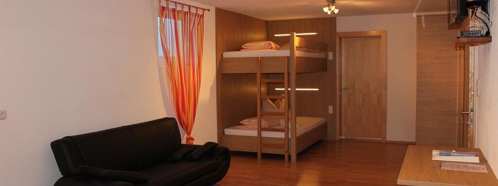 4-Bett Zimmer im UG mit Stockbett_1 - Chalet Mühle - Huben