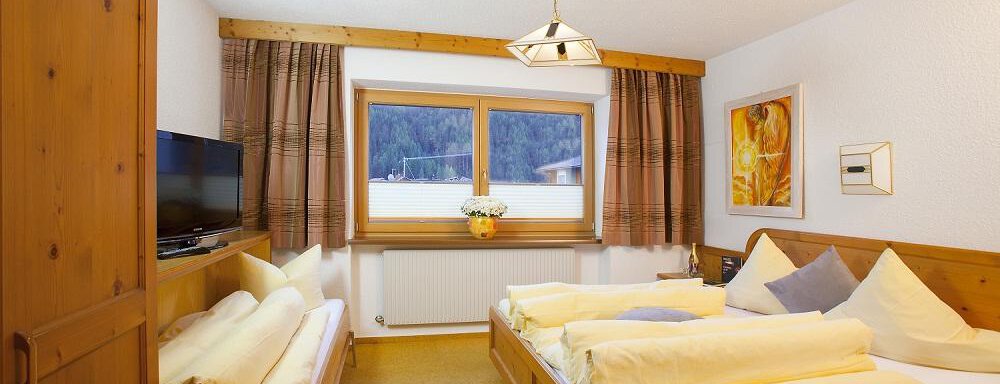 Schlafzimmer - Top Tirol Appartement - Huben