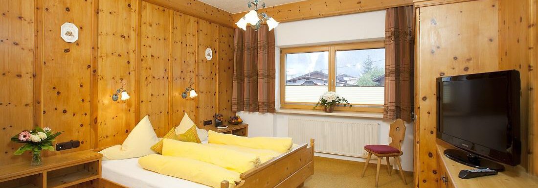 Schlafzimmer - Top Tirol Appartement - Huben