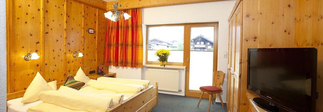 Schlafzimmer 1 - Top Tirol Appartement - Huben