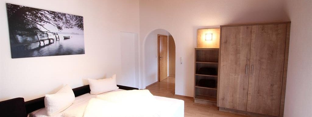 Wohnzimmer mit Couch mit Schlaffunktion - Andys Apartment - Längenfeld