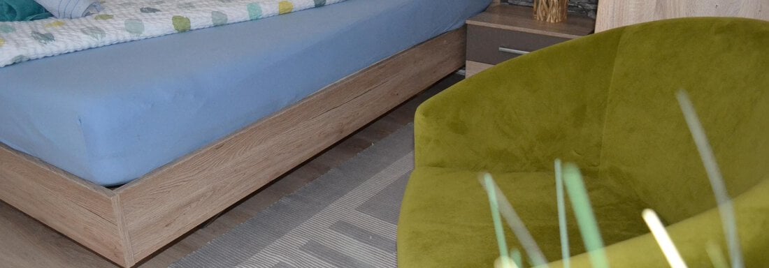 Schlafzimmer 1 neben Küche - Appartement Thermenzeit - Längenfeld