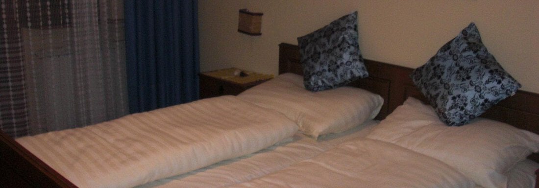 Doppelbettzimmer - Ferienwohnungen Kuen - Längenfeld