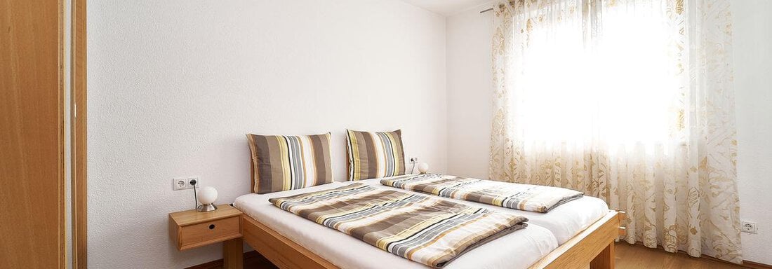 Schlafzimmer - Ferienwohnungen Vier Jahreszeiten - Längenfeld