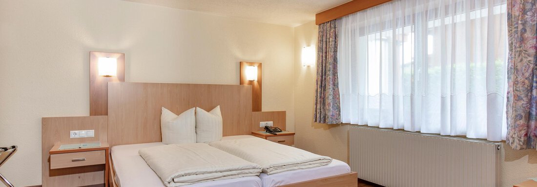 Doppelzimmer Mondschein mit Zustellbett - Garni Liesl - Längenfeld