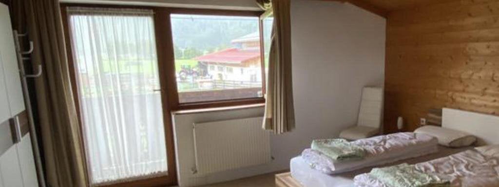 Doppelzimmer mit Zugang zum Balkon - Haus Reichlas - Längenfeld