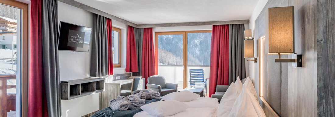 Doppelzimmer Deluxe - Hotel Burgstein alpin & lifestyle - Längenfeld