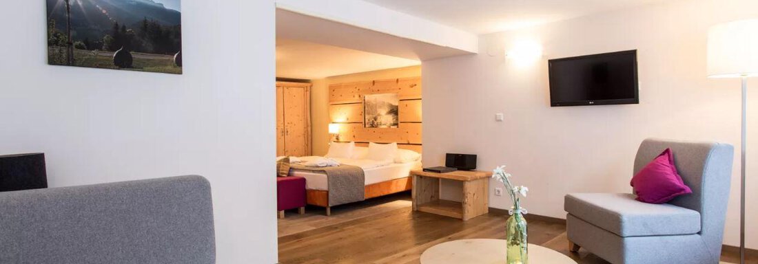 Doppelzimmer Bärenkopf de Luxe Wohn_Schlafraum - Hotel Ritzlerhof****S - Sautens