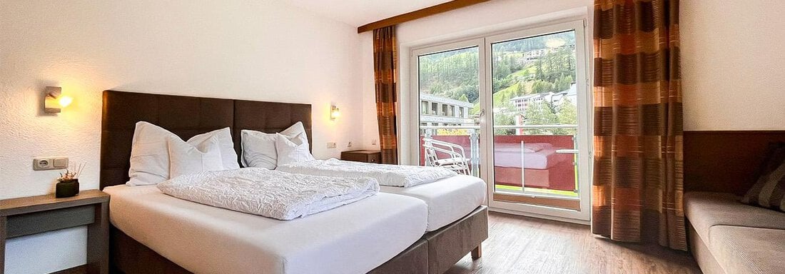 Schlafzimmer_doppelzimmerplus_bergheim1_WZ - Sporthotel Garni Bergheim - Sölden