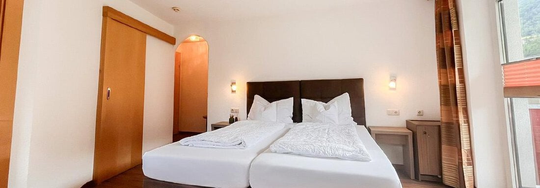 Schlafzimmer_doppelzimmerplus_bergheim_WZ - Sporthotel Garni Bergheim - Sölden