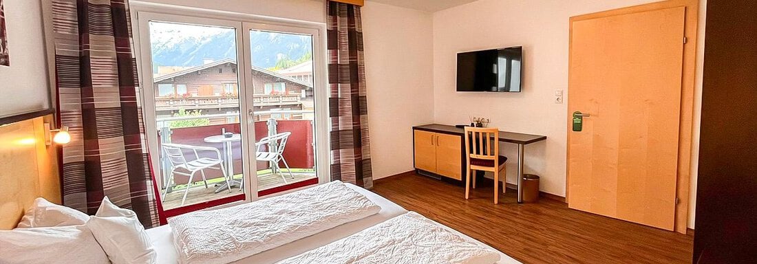 Schlafzimmer_bergheim_4personen_dz1_WZ - Sporthotel Garni Bergheim - Sölden