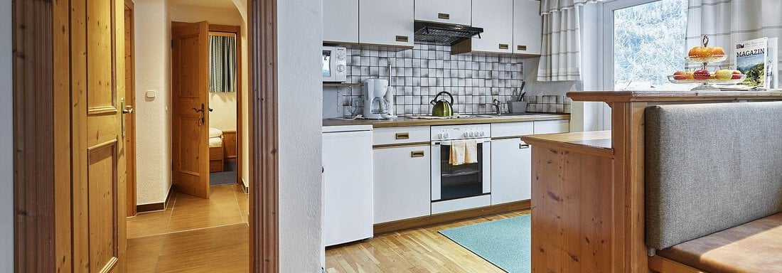 Küche mit Ausgang auf Sonnenterrase - Terrassenapartment Maria - Umhausen